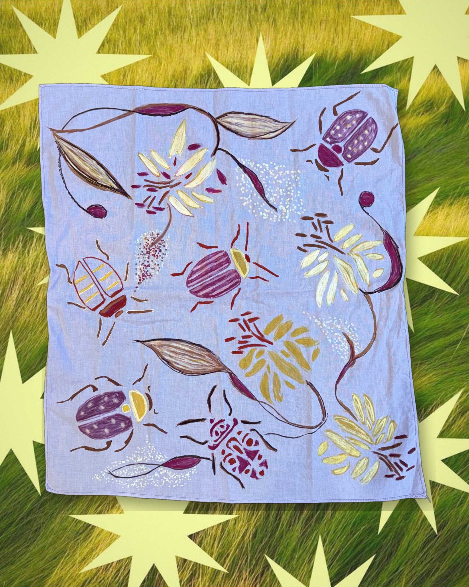 Beetle Bandana No. 6, lavender, styled over starry grass