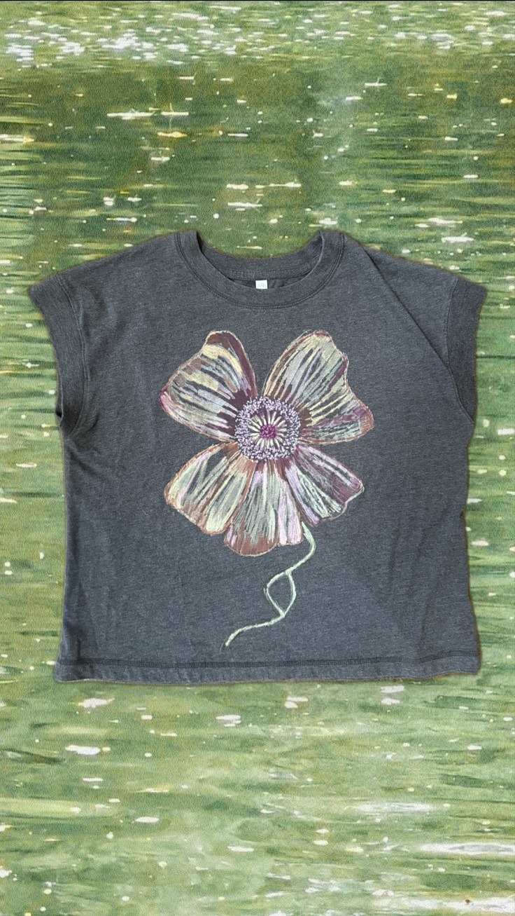 Wild Rose Relaxed Tee styled over shimmering green pond water